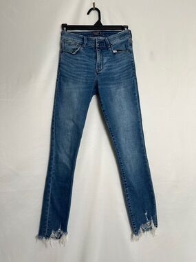 Women’s Mid Wash Blue Skinny Jeans with Raw Hem